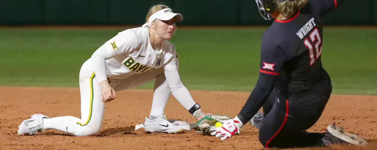 Leah Cran tagging out Texas Tech runner at second