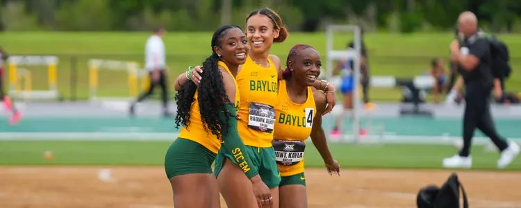 Women's 4x1 Big 12 winning celebration infield