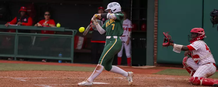 Kaci West hitting against Houston