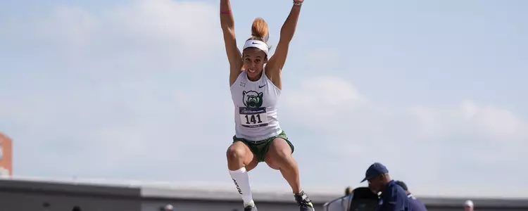 Alexis Brown long jumping at 2024 regional meet