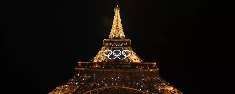 PARIS, FRANCE - JULY 26: A general view shows the Eiffel Tower with the Olympics Rings during the Opening Ceremony of the Olympic Games Paris 2024 on July 26, 2024 in Paris, France. (Photo by Luis Robayo - Pool/Getty Images)