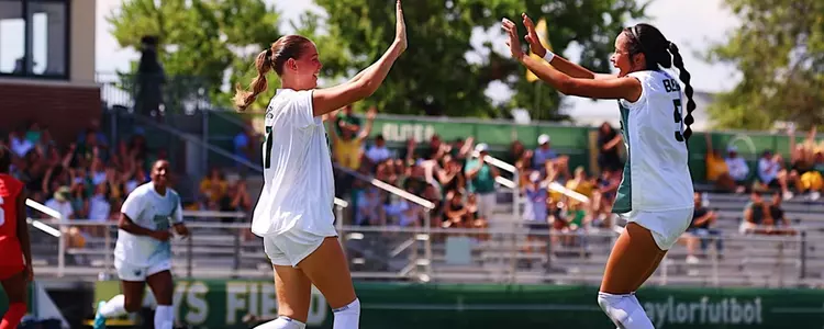 Hallie Augustyn and Skye Leach celebrate after a goal