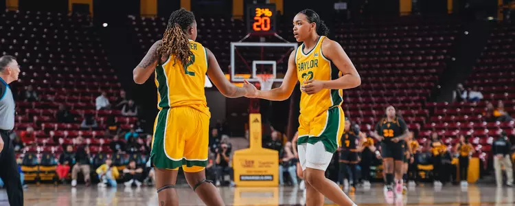 Bella and Yaya handshake at ASU