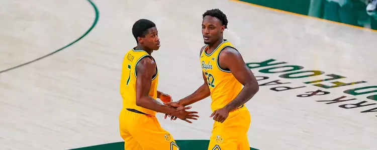 Jalen and VJ handshake vs. K-State