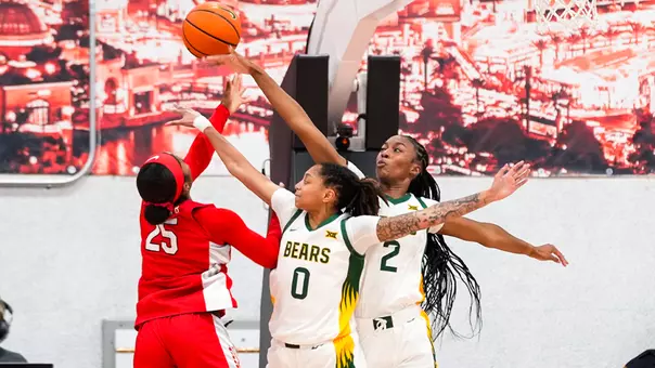 Kiersten Johnson and Taliah Scott block UNLV in Vegas