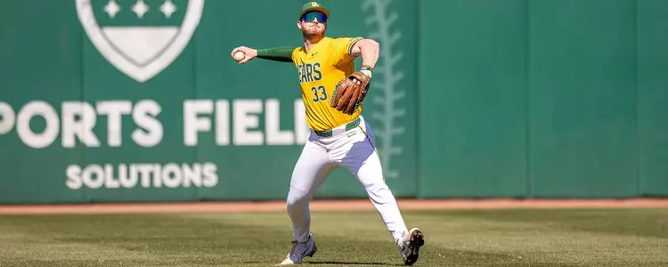 Wesley Jordan throwing a baseball from the outfield 2025