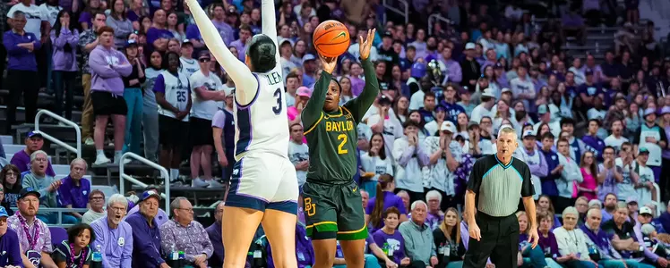 Yaya Felder shoots a three against K-State