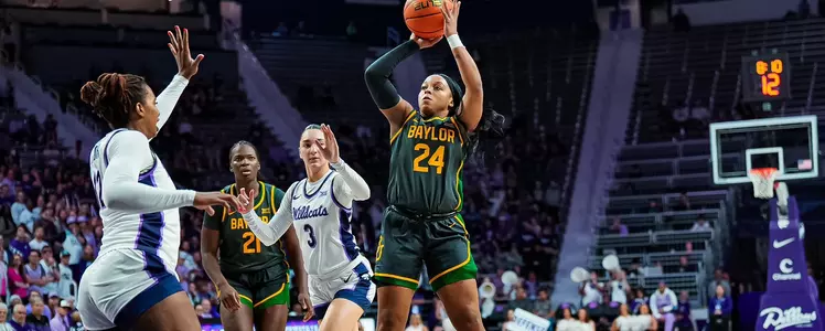 Sarah Andrews shoots a three against K-State
