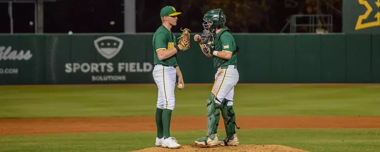 Caleb Jameson and JJ Kennett fist bump 2025