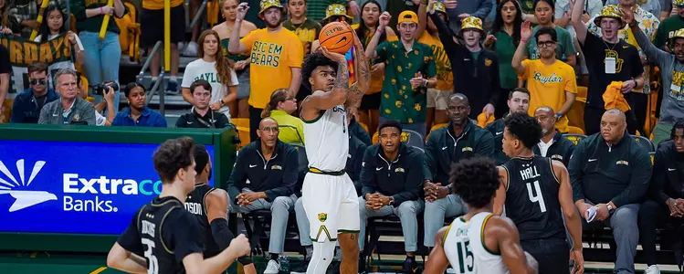 Langston Love shoots the three against UCF