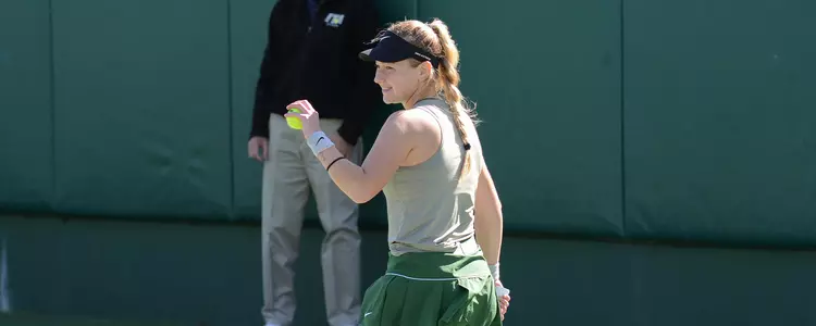 Luba Kostenko smiles before serving