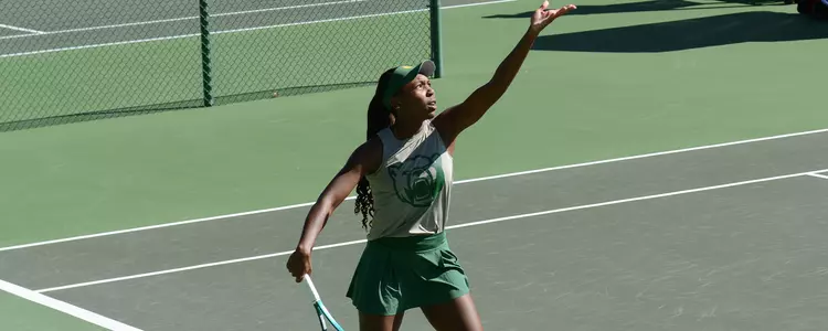 Kennedy Gibbs readies to serve vs Nebraska