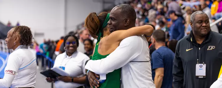 Alexis Brown & Coach Ford hugging