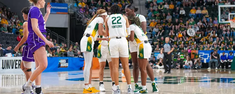 Team huddle vs GCU in NCAA First Round