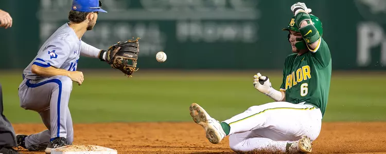 Travis Sanders sliding into second base 2025