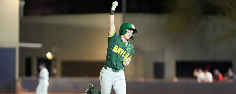 JJ Kennett rounds third after a home run at Arizona 2025