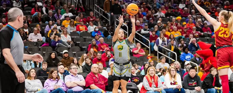 Jada Walker shoots a three against ISU in the Big 12 Tournament