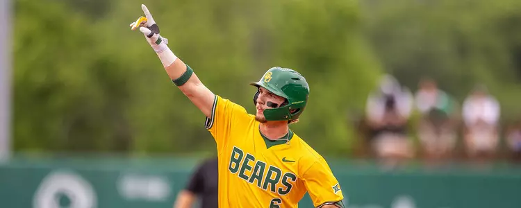 Travis Sanders pointing after a home run 2025