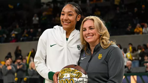 Darianna Littlepage-Buggs and Nicki Collen in pregame ball presentation for 1,000 career rebounds