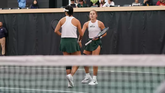 Zuzanna Kubacha and Na Dong during doubles vs Tulane 2026