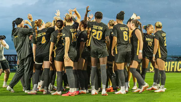 Rainy soccer huddle ahead of Kansas match