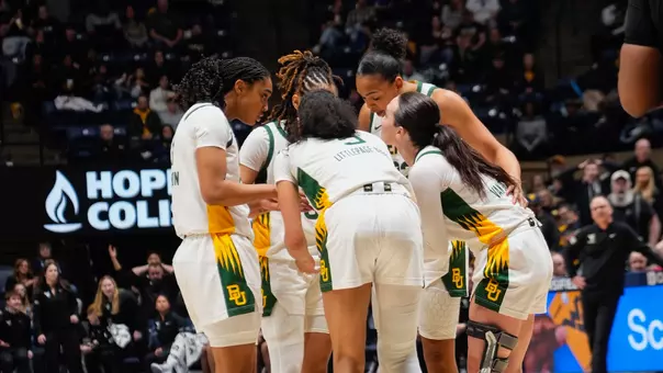 WBB team huddle at WVU