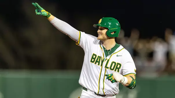 Tyce Armstrong waving while rounding the bases 2026