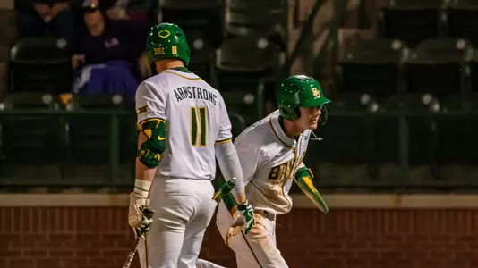 Brady Janusek and Tyce Armstrong high five 2026
