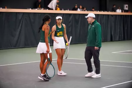 Joey Scrivano coaches Mu-Jie and Gabby in doubles vs SMU