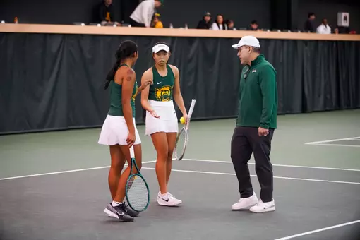 Joey Scrivano coaches Mu-Jie and Gabby in doubles vs SMU