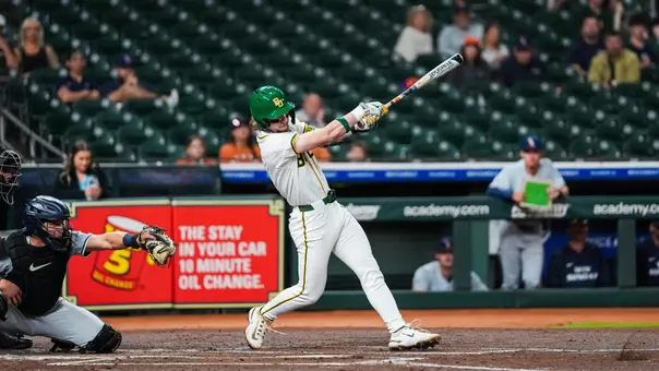 Travis Sanders hitting at Daikin Park 2026