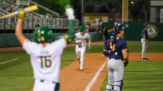 Travis Sanders scoring against West Virginia 2026