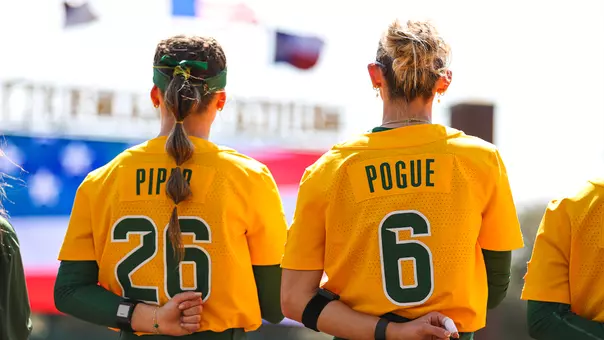 Faith Piper and Savannag Pogue Pose for the National Anthem