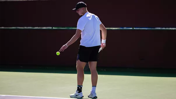 Devin Badenhorst getting ready to serve