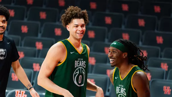 Dan Skillings and Obi Agbim laughing during shootaround
