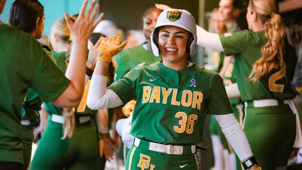 Amber Toven High Fives against UIW