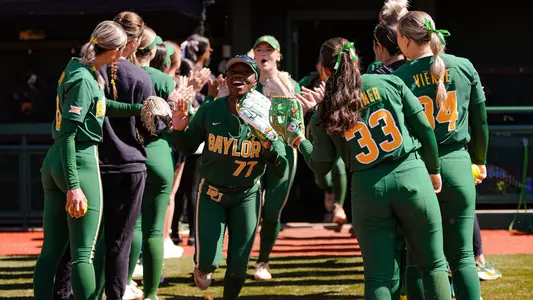 Sa'Mya Jones runs out of the tunnel against Utah