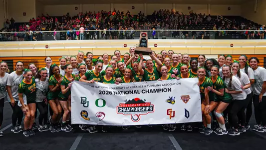 11x National Champions with Banner