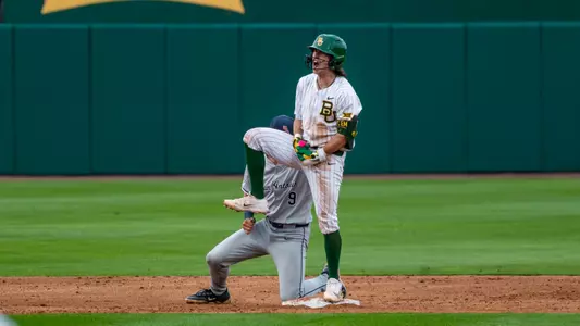 JJ Kennett celebrating at second base 2026