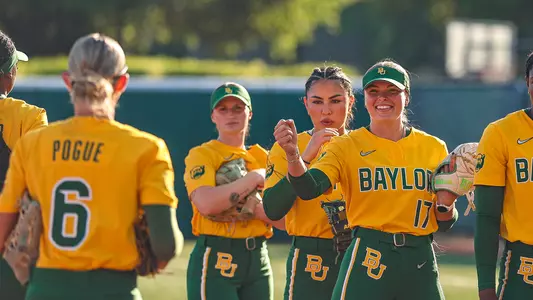 Gigi Lindsey Fist Bumps Teammates before a game