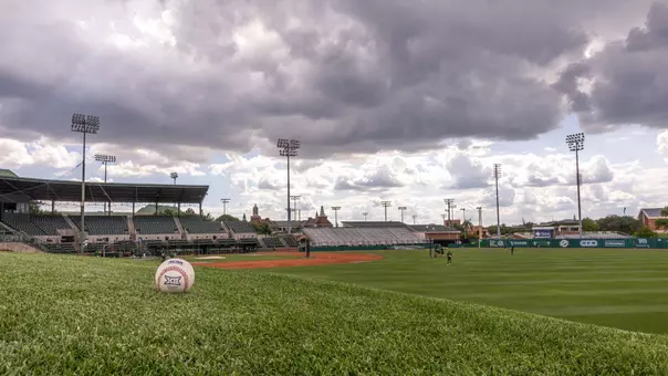 Baseball on berm at Baylor Ballpark