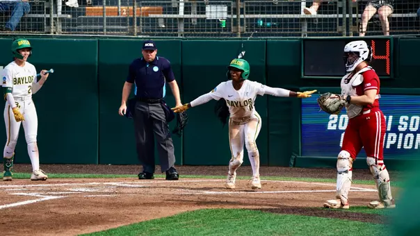 Brooklyn Carter Slides in Safely against Wisconsin in the NCAA AUstin Regional