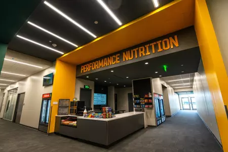 Nutrition station at Fudge Football Development Center with snacks, nutrition and drinks for football student-athletes