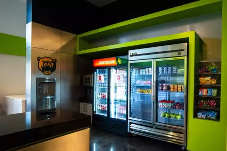 Photos of Simpson Weight Room Nutrition Area with snacks and drinks displayed for student-athletes