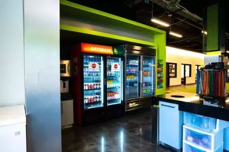 Photos of Simpson Weight Room Nutrition Area with snacks and drinks displayed for student-athletes