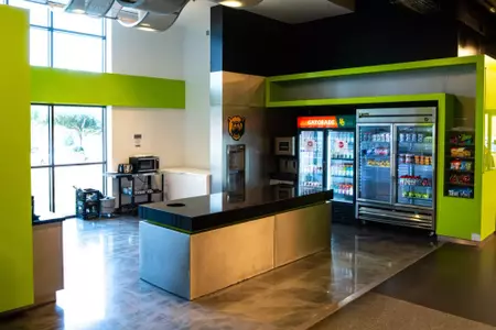 Photos of Simpson Weight Room Nutrition Area with snacks and drinks displayed for student-athletes