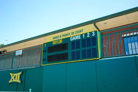 Exterior photos of the Hurd Tennis Center in 2026 featuring the courts, videoboard and grandstand seating