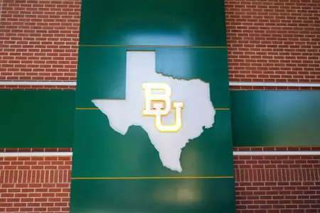 Still images of the Magnolia Field at Baylor Ballpark facility; signage and BU marks around the ballpark