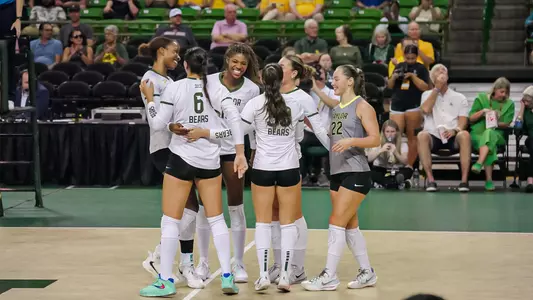 Baylor Celebrates a Point in Match against UIW
