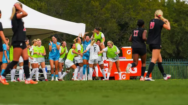 Lauren Omholt celebrates goal over Cincinnati